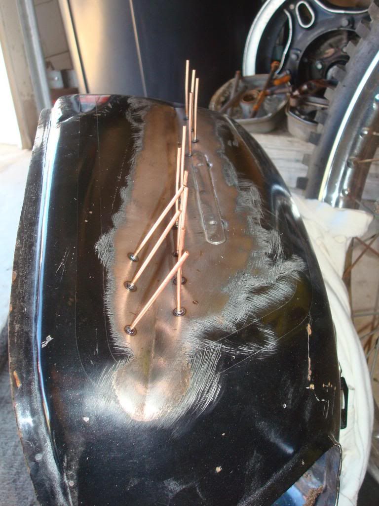 Gas tank dent repair