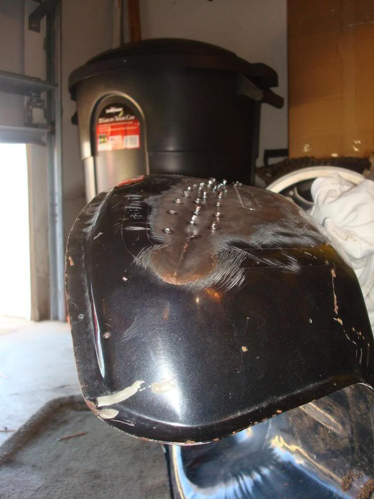 Gas tank dent repair